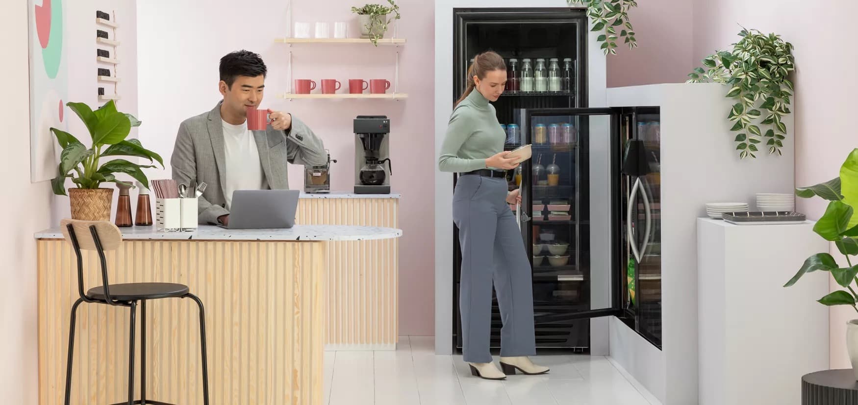 Employees enjoying a modern break room with smart cooler
